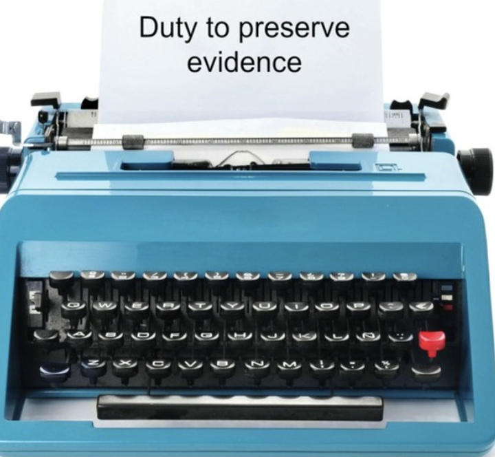 typewriter with text saying duty to preserve evidence